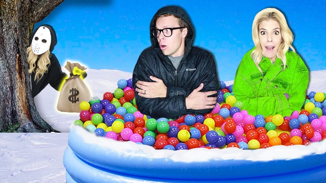 LAST TO LEAVE Giant Ball Pit in Snow Wins $10,000! (Game Master Hidden Clues & Rebecca Zamolo Twin)